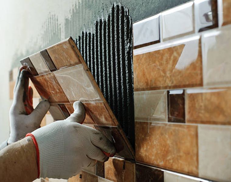 Bathroom tile fitting